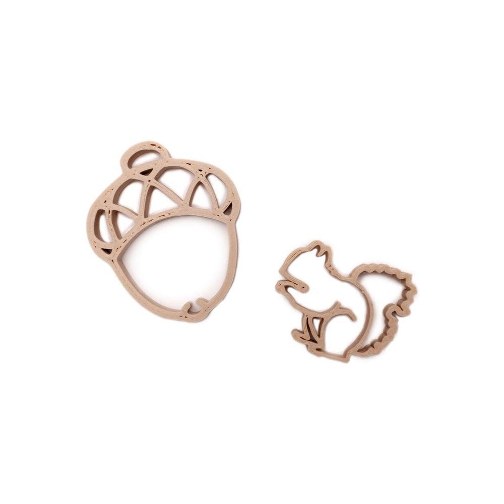 Grennn eekhoorn en eikel uitsteker